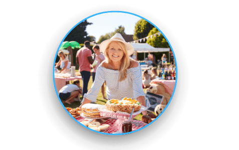 image of a women selling fundraising products on a sunny day