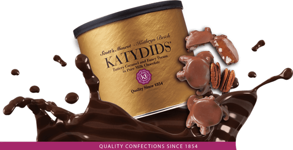 Gold Katydids tins on a chocolate wave
