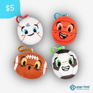 Four Sporty Backpack Buddies displayed side by side, showing the different scented plush characters and their unique designs, each with a clip for attaching to backpacks or bags.